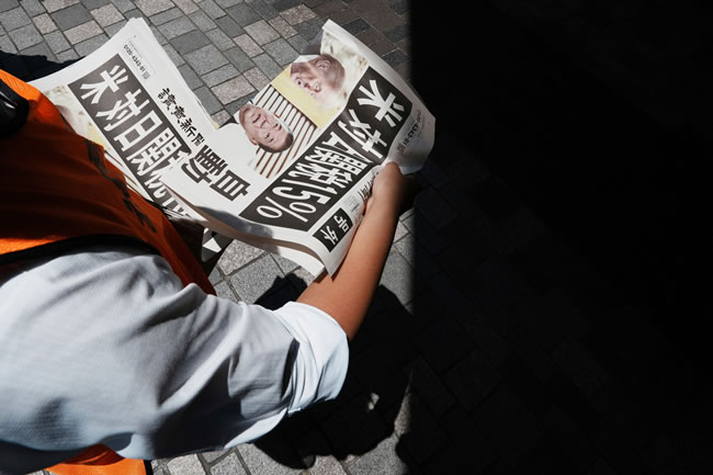 美日谈判时出现大图卡 川普打X加码金额